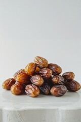 Obraz premium Organic Golden Dates – Wrinkled Texture and Rich Color on White Background