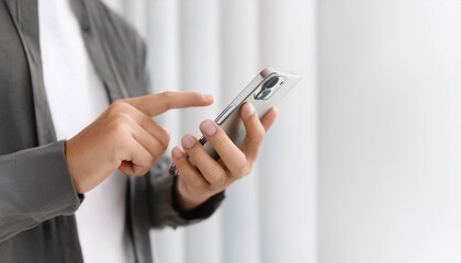 Holding and using the latest smartphone
