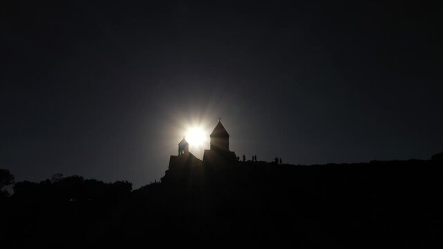 Silhouette, drone shot of the Saghmosavank monastery in the village of Saghmosavan, Armenia