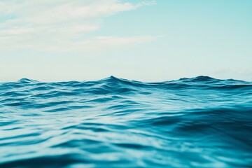The ocean is calm and peaceful, with no signs of waves or ripples. strategy with minimalist waves in light blue and white.