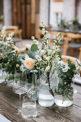 Wedding table, flowers in vase