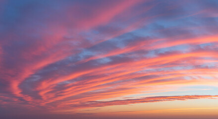Fototapeta premium Dramatic Pink and Orange Sunset Sky with Layered Cloudscape Evening Atmosphere