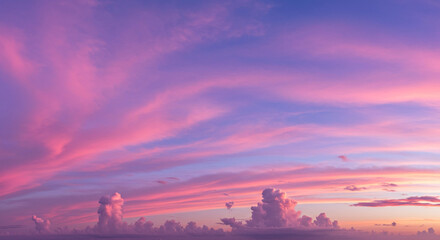 Serene Pink and Purple Sunset Sky with Fluffy Clouds Atmospheric Panorama