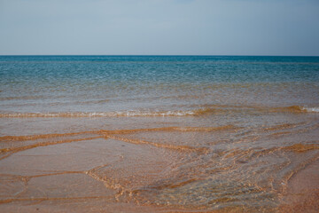 sand beach with waves