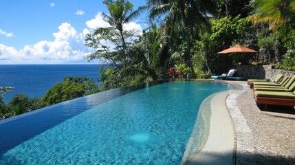 Obraz premium A tropical infinity-edge pool with panoramic views of the ocean and palm trees.