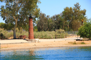 Replica of the Currituck Beach lighthouse on the Bridgewater Channel in Lake Havasu City, Arizona, USA on lake Havasu with blue sky copy space.