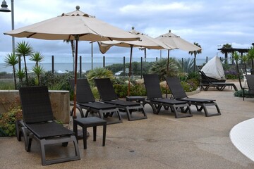 beach chairs and umbrellas