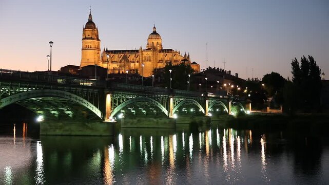 Salamanca cathedral and Tormes river, night view
