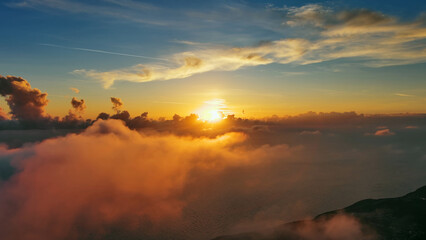 Aerial view of bright sunset clouds