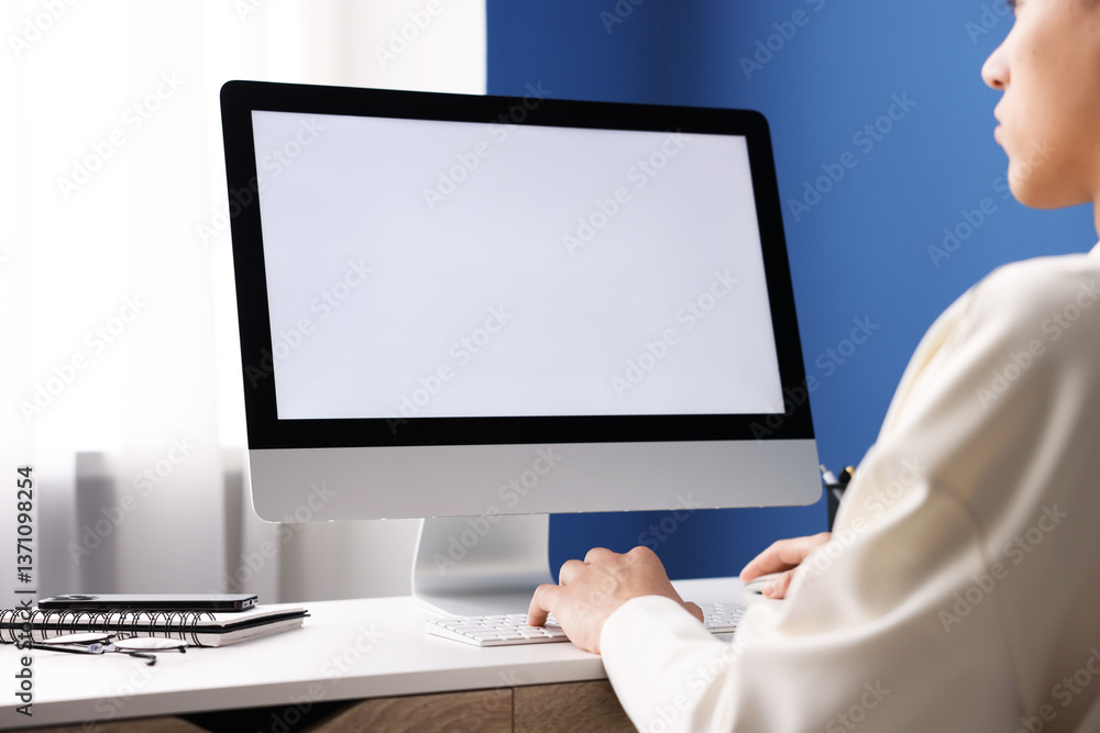 Poster man working on computer at white desk in office, closeup. mockup for design