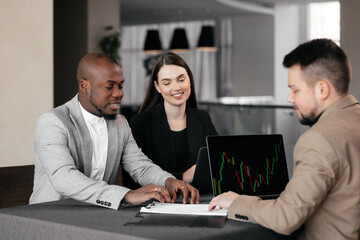 Financial advisor explaining invest stock market data consulting investor. Two busy business men...