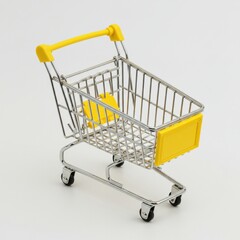 Bright yellow shopping cart with metallic frame and wire mesh basket toy-like miniature design isolated on white background