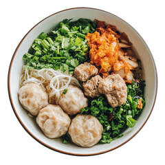 Fototapeta premium Delicious bakso served in a bowl with fresh herbs and noodles against a transparent background, bakso on bowl top view transparent background