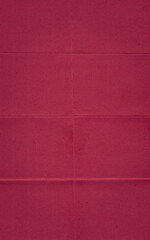 Fototapeta premium Folded Burgundy Paper Texture with Natural Fibers – Print Overlay Background. The clean yet tactile finish makes this paper perfect for adding depth and realism to layered designs.