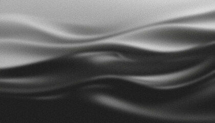 Black and white gradient background forming soft waves