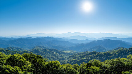 Obraz premium Scenic Mountain Landscape With Lush Green Forest Under Bright Sunny Sky