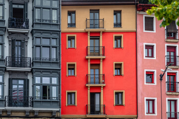 Colorful facades of historic buildings in Bilbao