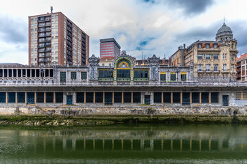 Ornate Bilbao train station by the river