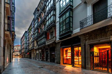 Early morning bakery lights in Bilbao old town