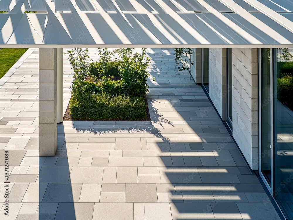 Aufkleber modern architecture with clean lines and geometric shadows on a pavement surrounded by greenery and 
