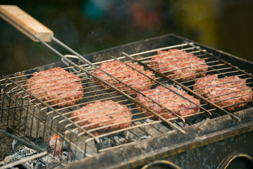 Frying patties on the grill