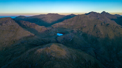 View of Lake Ditkevi in ​​Chirripo National Park amid a beautiful and colorful summer sunrise...
