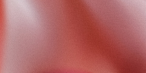 Abstract background featuring a blend of soft pink and red hues with a grainy texture effect