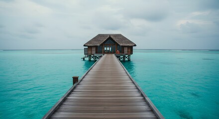 Obraz premium Overwater Bungalow in Tropical Sea