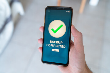 Backup completed notification on smart phone.