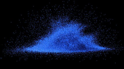 A vibrant blue powdery substance forming a dynamic mound against a dark background