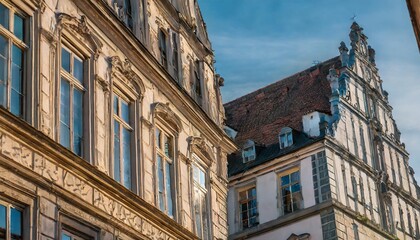 Obraz premium Windows of Old Buildings Reflecting Stories of Time in Subtle Evening Hues