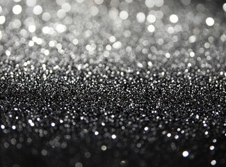 White bokeh lights on black background, defocused light string decoration. Abstract blurred white glowing round boke effect for wedding or Christmas card design