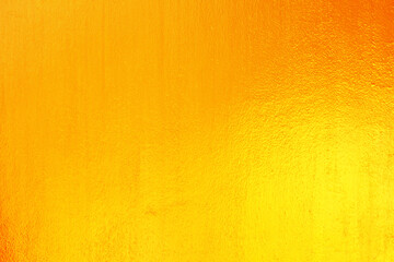 Gold paint on cement wall texture