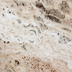 Brown stone with cracks on the surface