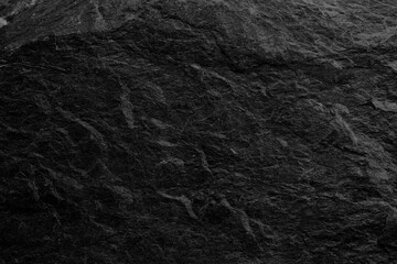 Dark grey black slate background or texture.