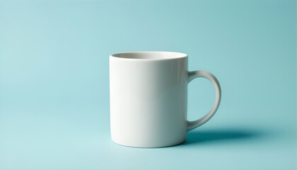 Obraz premium White Mug on Light Blue Background for Mockup Presentation
