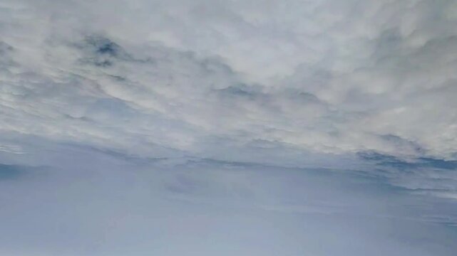 white clouds fly marching at the high sky