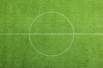 Obraz premium Football field with markings on green turf