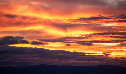 Sunset in the mountain west of the USA with  red yellow tones