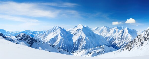 Obraz premium Snow-Capped Mountain Peaks under a Clear Blue Sky