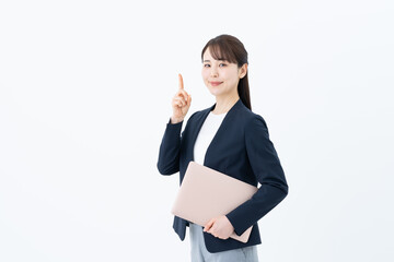 パソコンを持つビジネスウーマン
