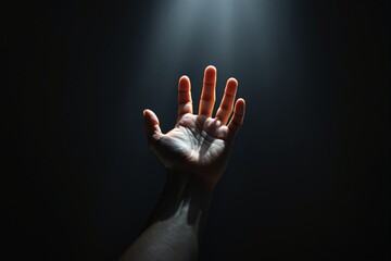 Outstretched human hand reaching up toward a focused light source, creative concept of hope or seeking, dramatic lighting, dark background. Ai generative
