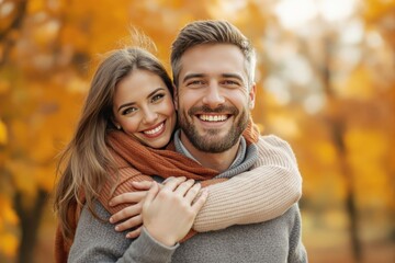 Naklejka premium Happy couple hugging and smiling outdoors in autumn park, warm clothes, soft focus background, concept of love and togetherness. Ai generative