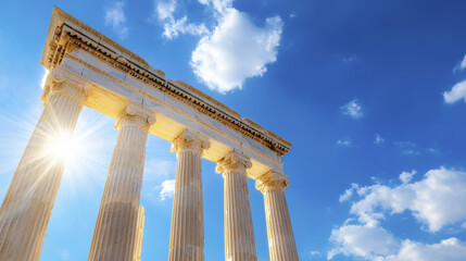 Fototapeta premium Majestic marble columns under bright blue sky, showcasing ancient architecture and historical beauty