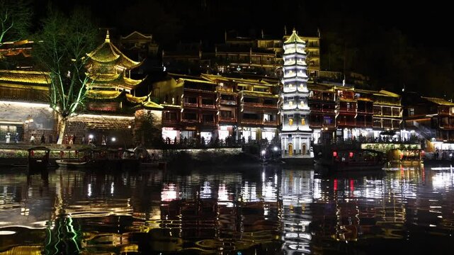 Night boat tour along Tuo River in Fenghuang Ancient Town, Hunan, China