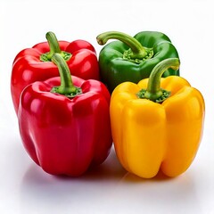 A fresh red, yellow, and green bell pepper isolated on a white background