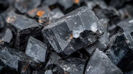 Fototapeta premium Black Tourmaline Crystal Pile Raw Stones Rough Mineral Texture Background