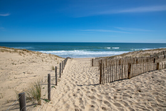 sandy vacation pathway access sea atlantic beach water waves in le grand crohot in lege cap-ferret France