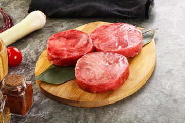 Delicous raw tuna medallion for cooking