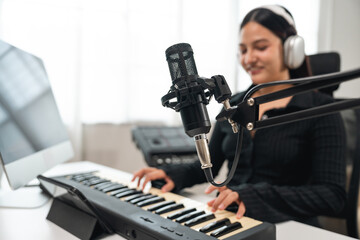 Professional Musician with condenser microphone and tablet for Mixing Mastering music. Music...